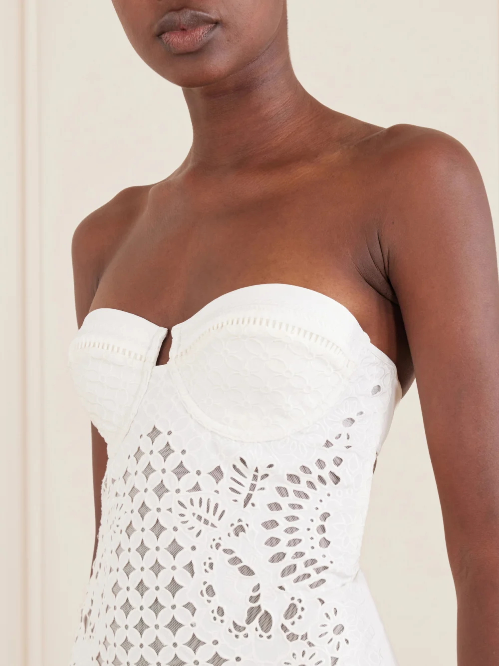 Close-up detail of the Zimmermann Indra Strapless Broderie Anglaise Swimsuit