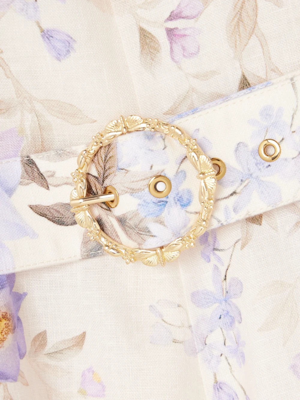 Close-up detail of the Zimmermann Luna Belted Floral-print Linen Mini Dress