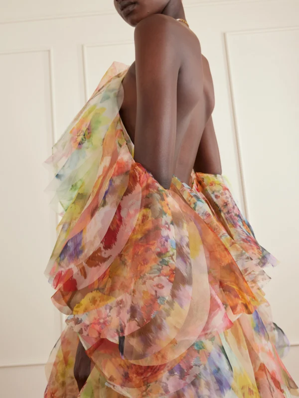 Close-up detail of the Zimmermann Luna Tiered Ruffled Floral-print Chiffon Halterneck Midi Dress