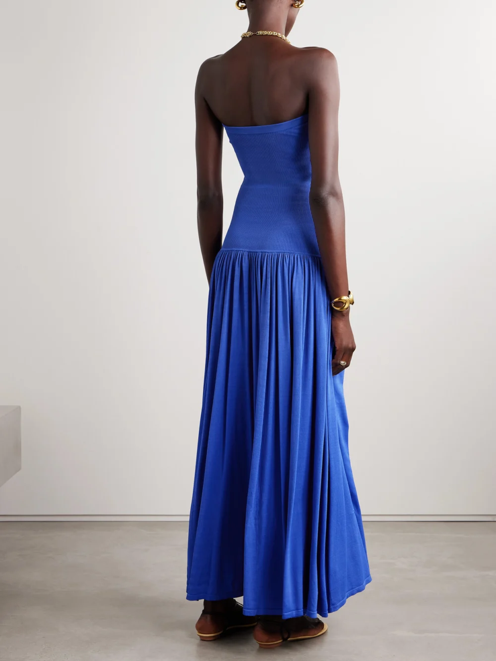 Back view of the Zimmermann Maxine Strapless Ribbed Gathered Stretch-knit Maxi Dress