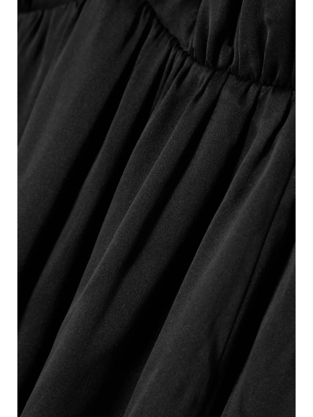 Close-up detail of the Zimmermann Open-back Gathered Silk Maxi Dress