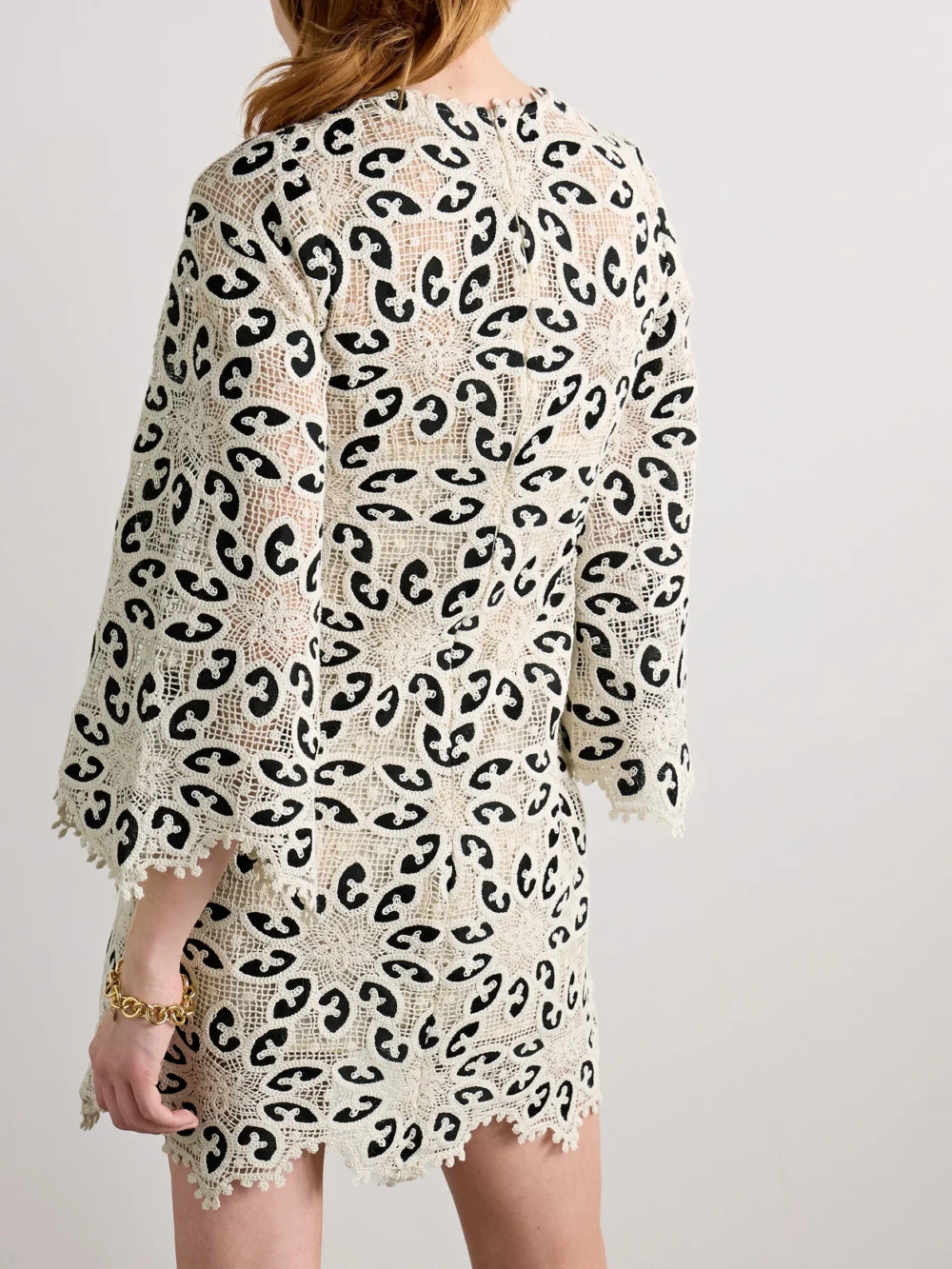 Back view of the Zimmermann Ottie Cotton-blend Guipure Lace Mini Dress