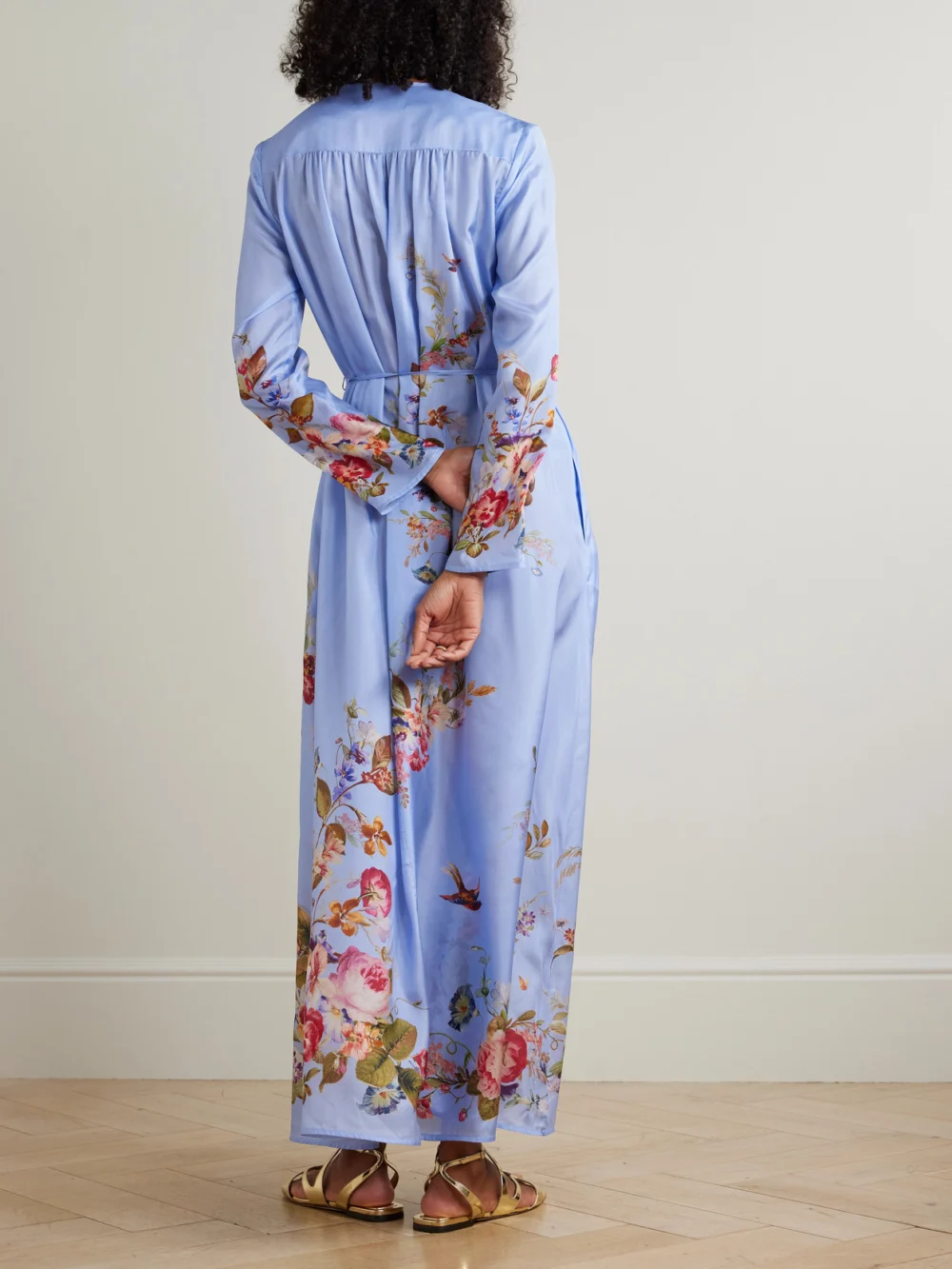 Back view of the Zimmermann Patience Gathered Floral-print Silk Maxi Dress