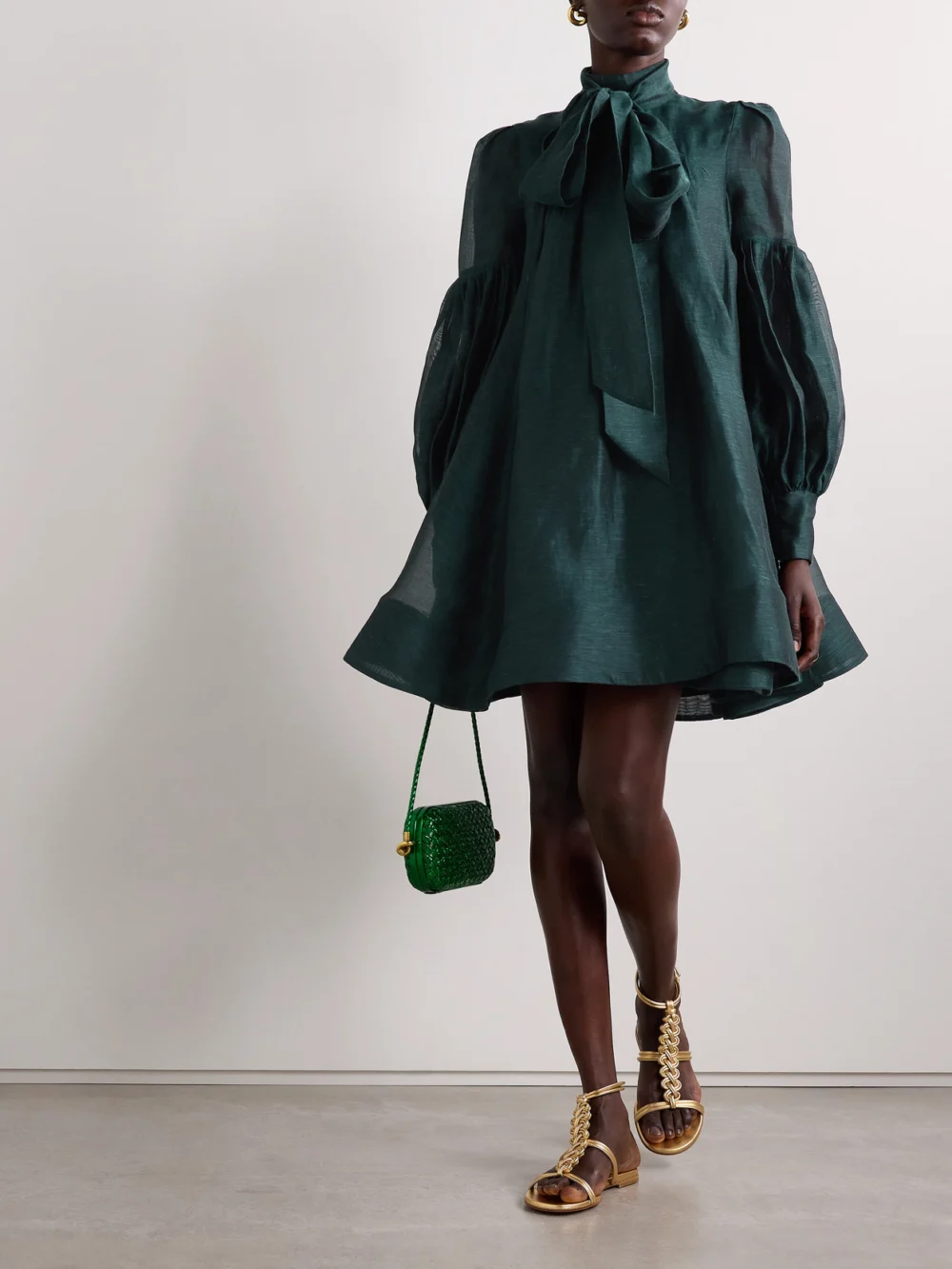 Zimmermann Pavillion Tie-neck Pleated Linen and Silk-blend Organza Mini Dress, worn by a model
