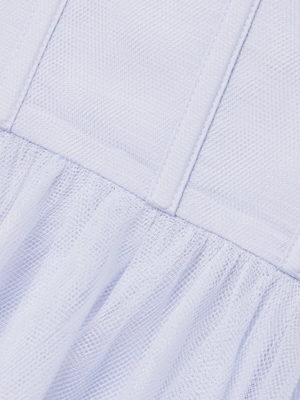 Close-up detail of the Zimmermann Pleated Tulle Midi Dress