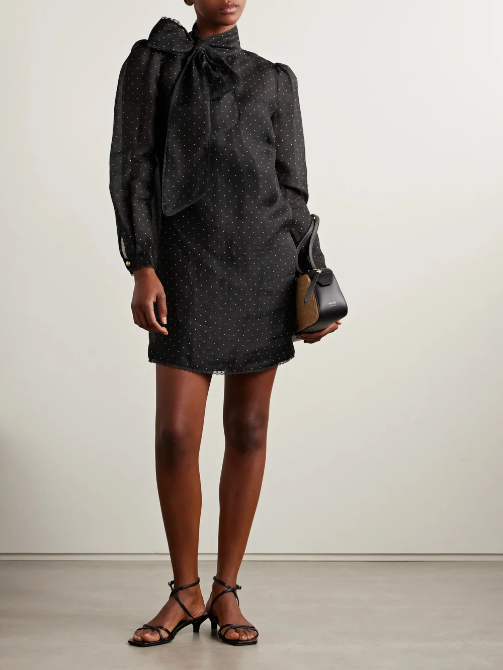 Zimmermann Pussy-bow Lace-trimmed Polka-dot Linen and Silk-blend Organza Mini Dress, worn by a model