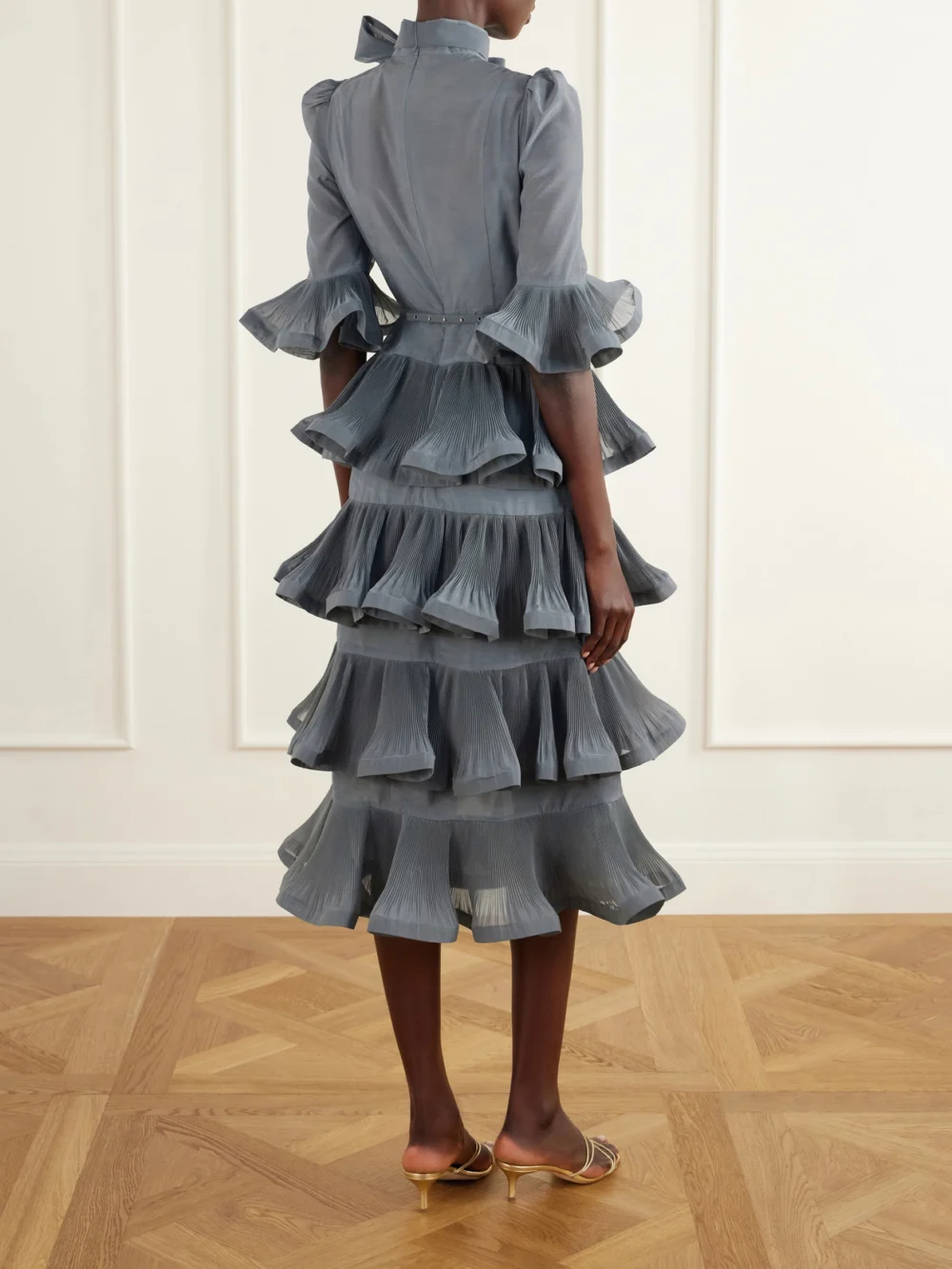 Back view of the Zimmermann Pussy-bow Ruched Tiered Plissé Organza Midi Dress