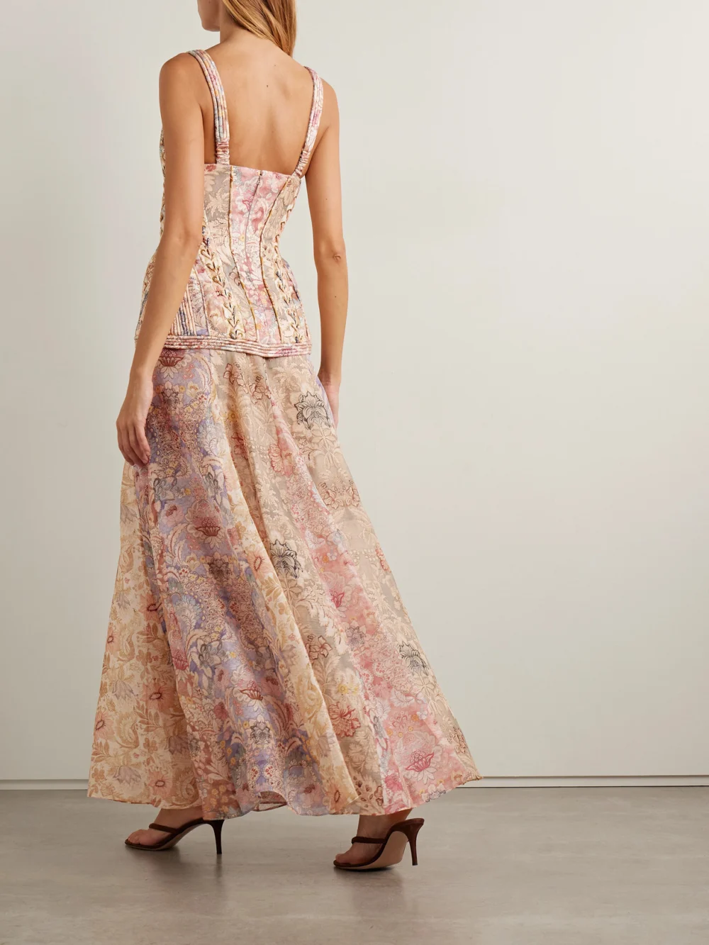Back view of the Zimmermann Rebellion Paneled Layered Printed Linen Maxi Dress