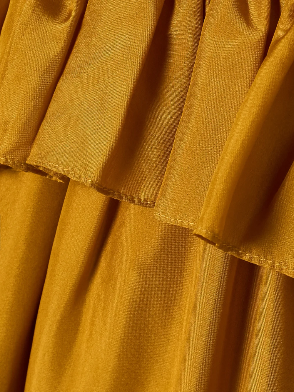 Close-up detail of the Zimmermann Rhiannon Ruffled Silk Maxi Dress