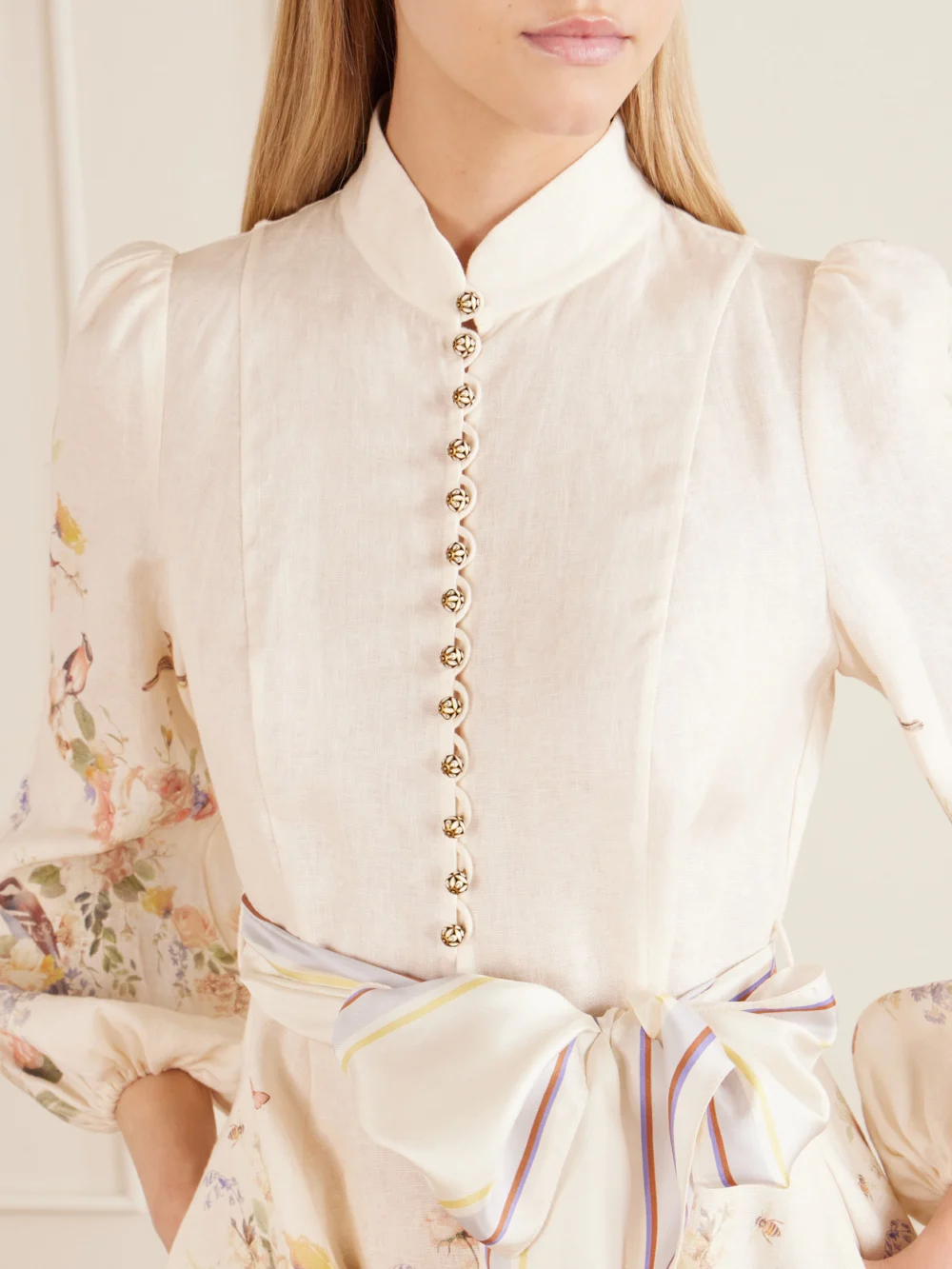 Close-up detail of the Zimmermann Valiant Belted Floral-print Linen Mini Dress