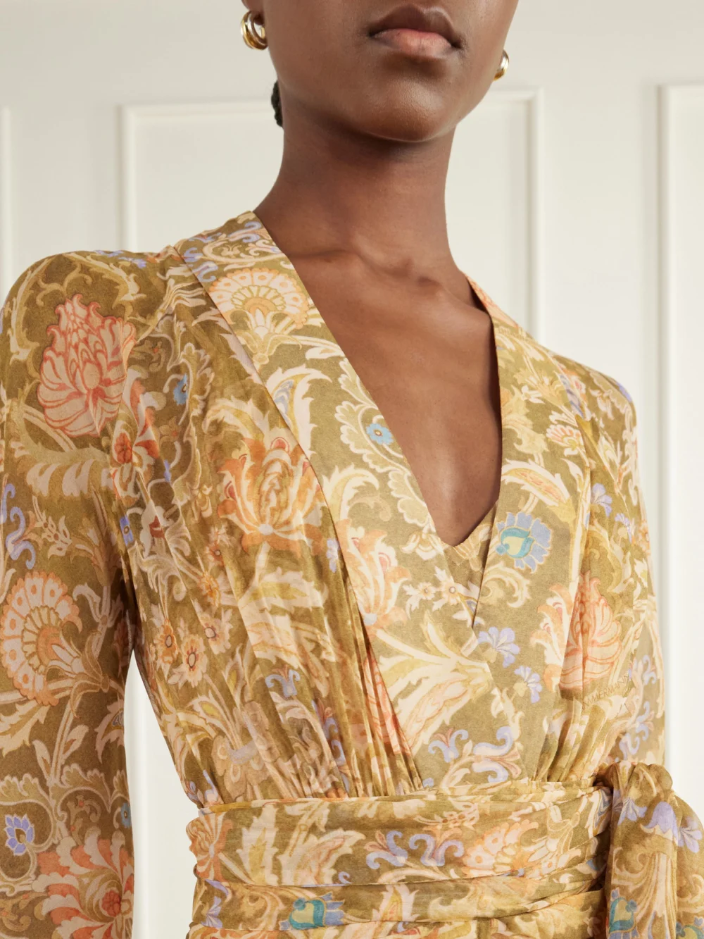 Close-up detail of the Zimmermann Valiant Tiered Ruffled Floral-print Silk-chiffon Wrap Maxi Dress
