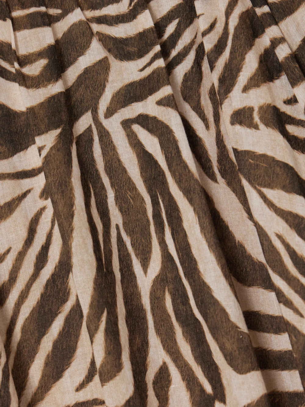 Close-up detail of the Zimmermann Wanderlust Gathered Zebra-print Cotton Maxi Dress