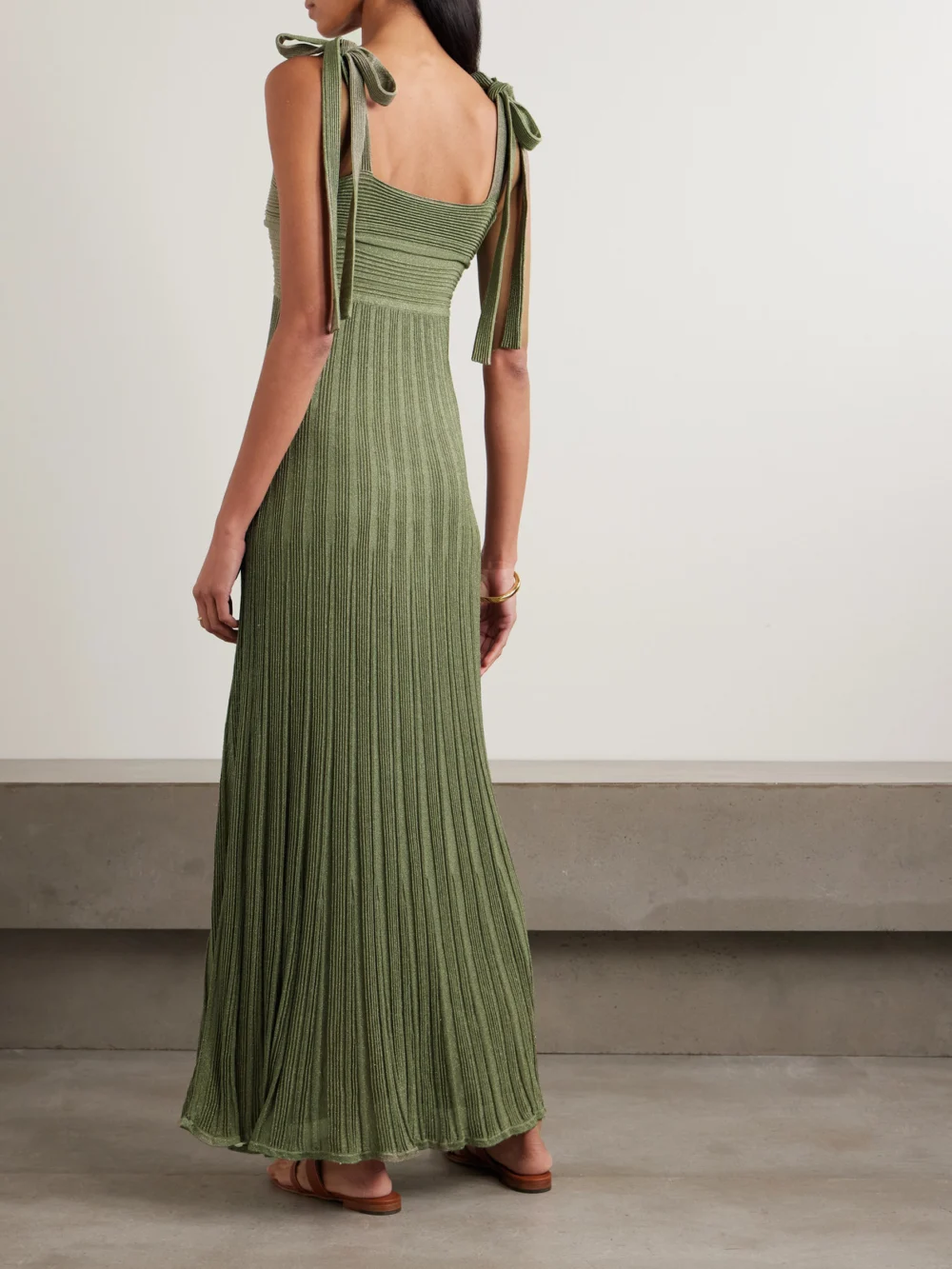 Back view of the Zimmermann Wanderlust Metallic Ribbed-knit Maxi Dress