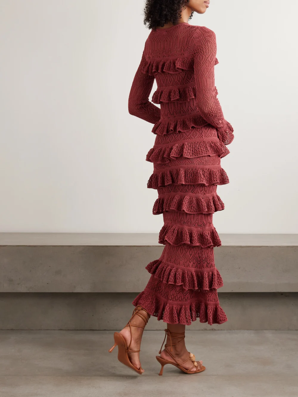 Back view of the Zimmermann Wanderlust Ruffled Open-knit Maxi Dress