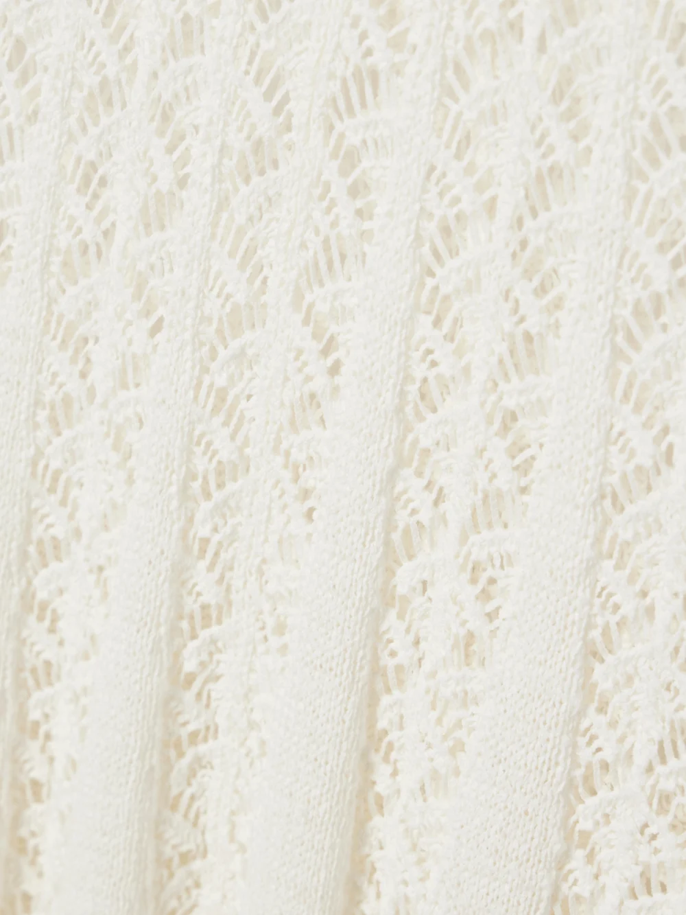 Close-up detail of the Zimmermann Wylie Open-knit Cotton Maxi Dress