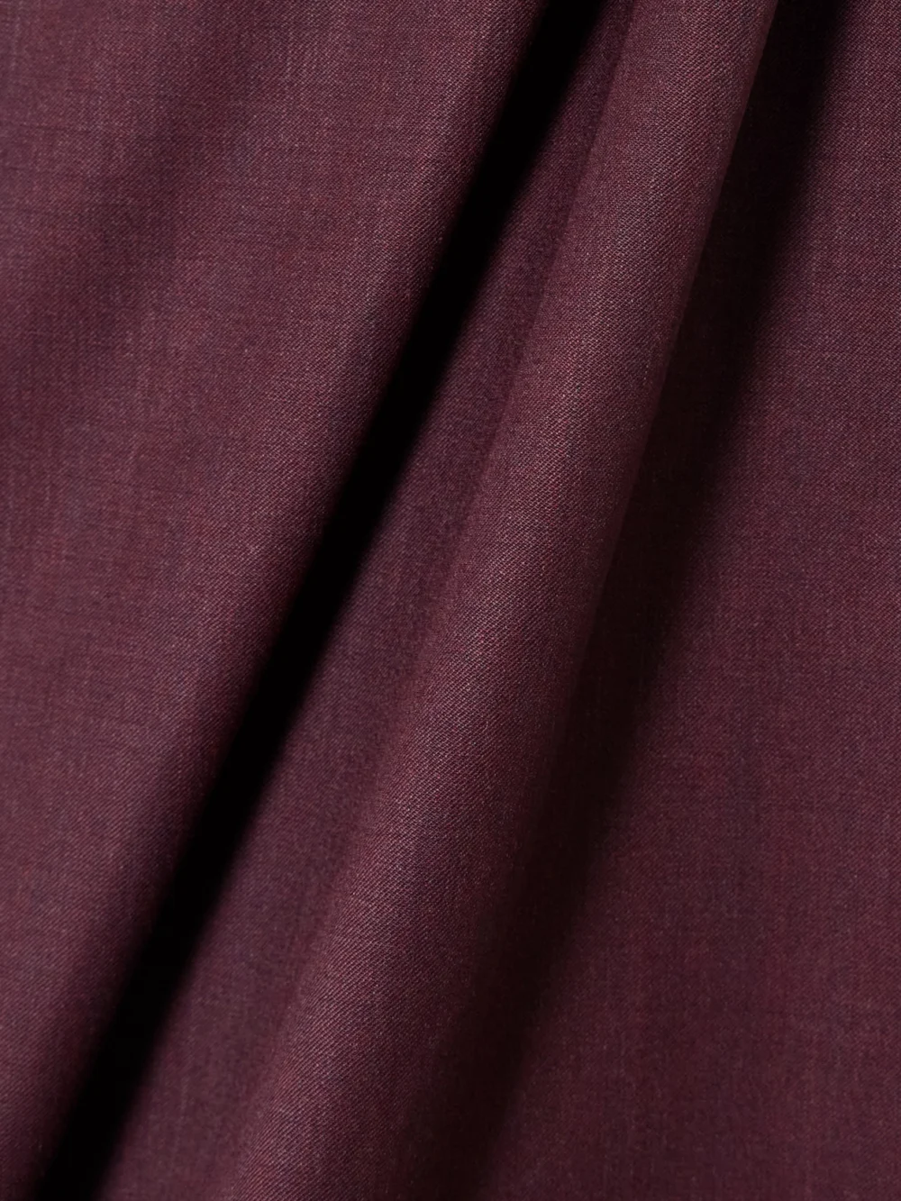 Close-up detail of the Abadia Ayla One-shoulder Draped Wool-blend Twill Top