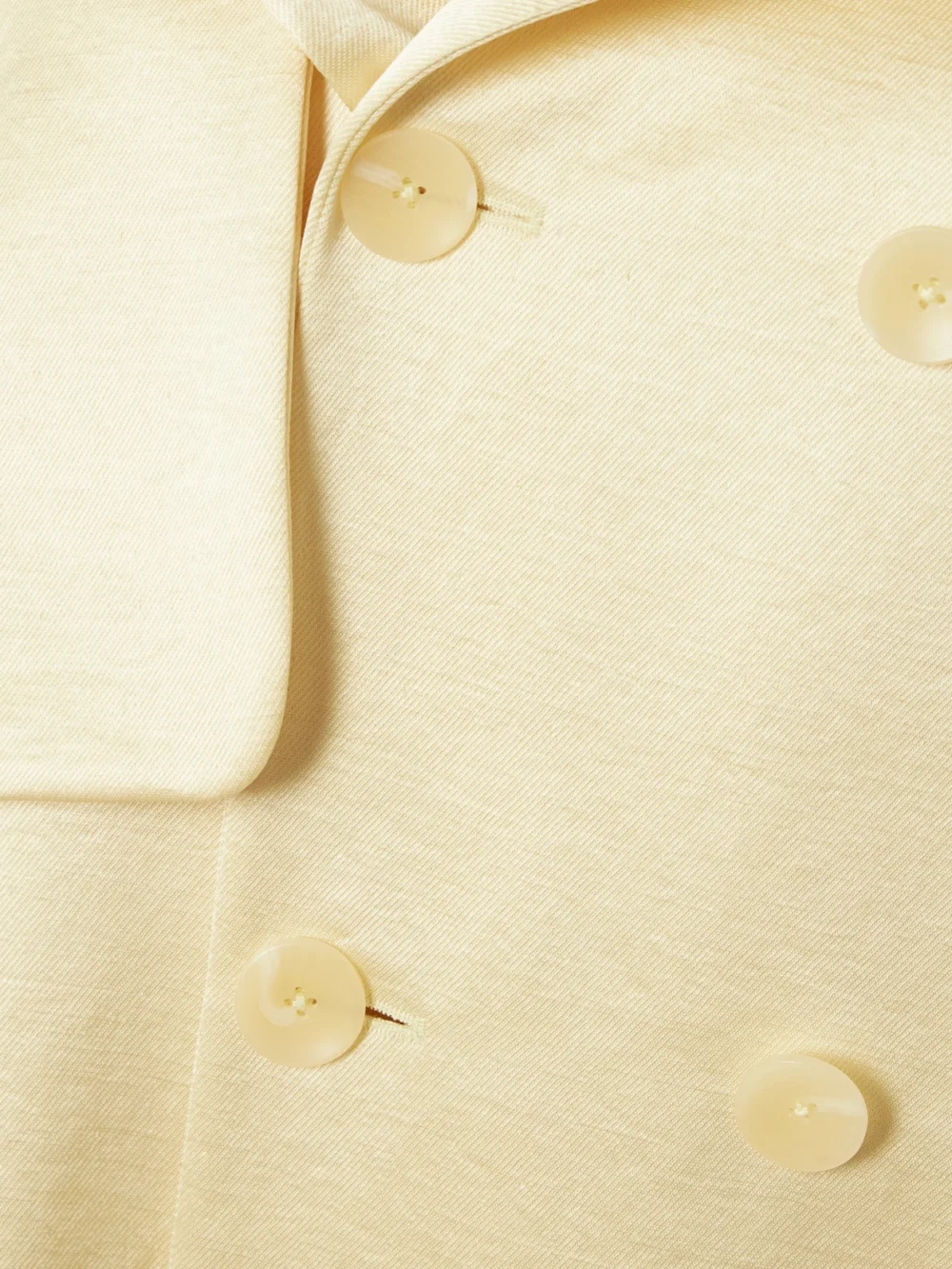 Close-up detail of the Abadia Double-breasted Satin-twill Trench Coat