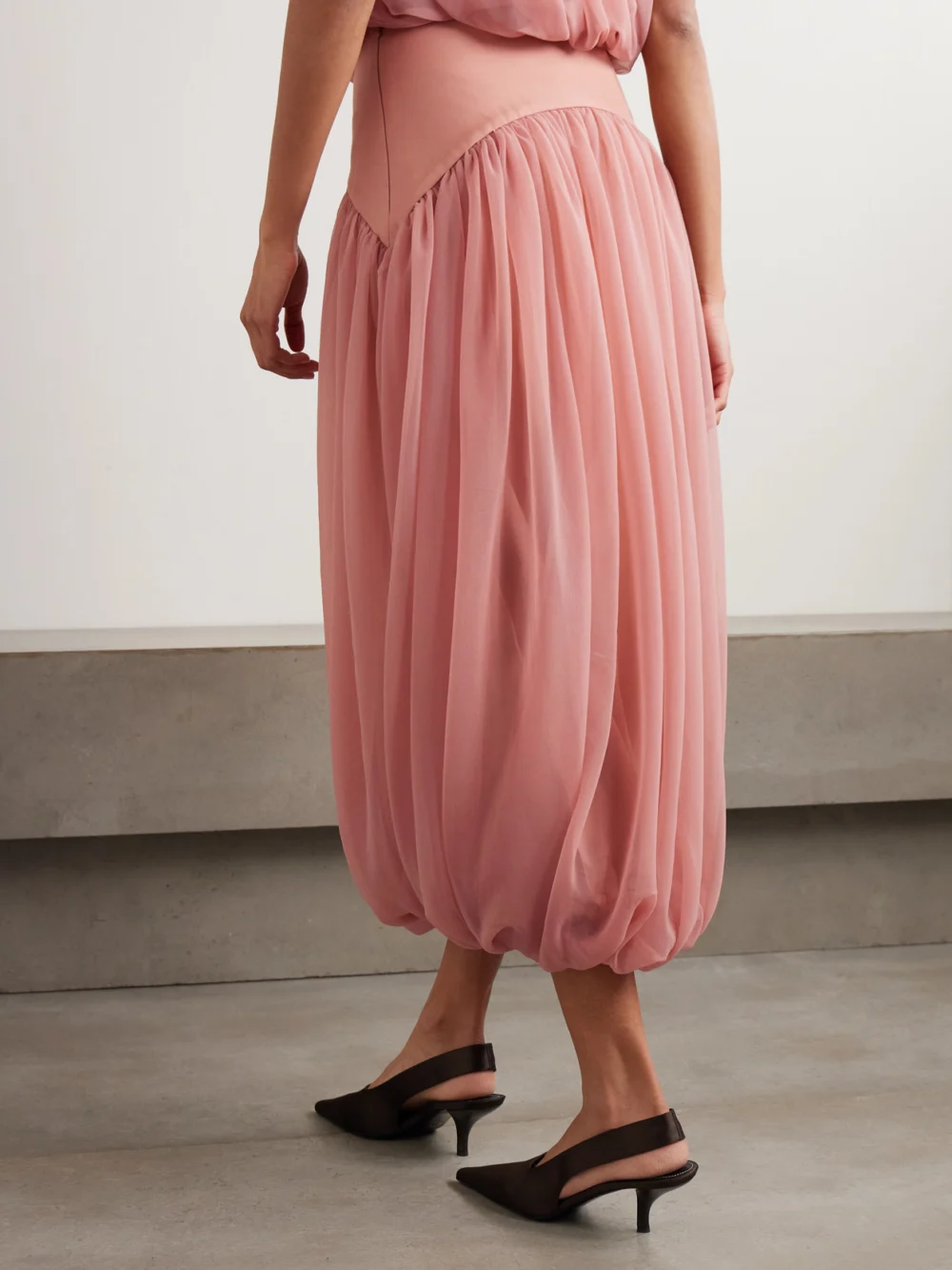 Back view of the Abadia Paneled Gathered Twill and Chiffon Maxi Skirt