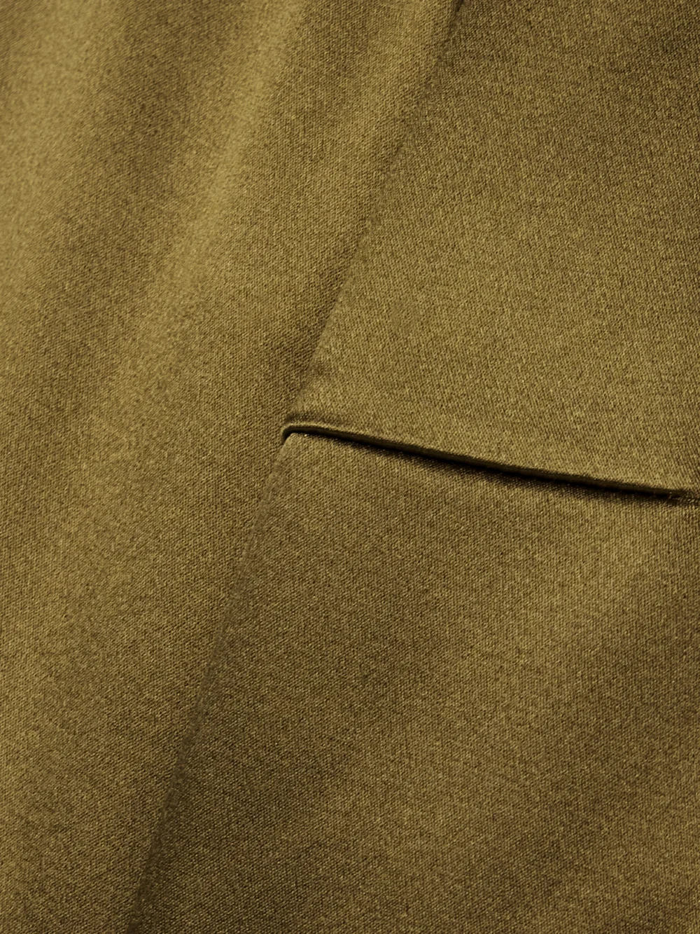 Close-up detail of the Adam Lippes Keira Cropped Silk-charmeuse Top