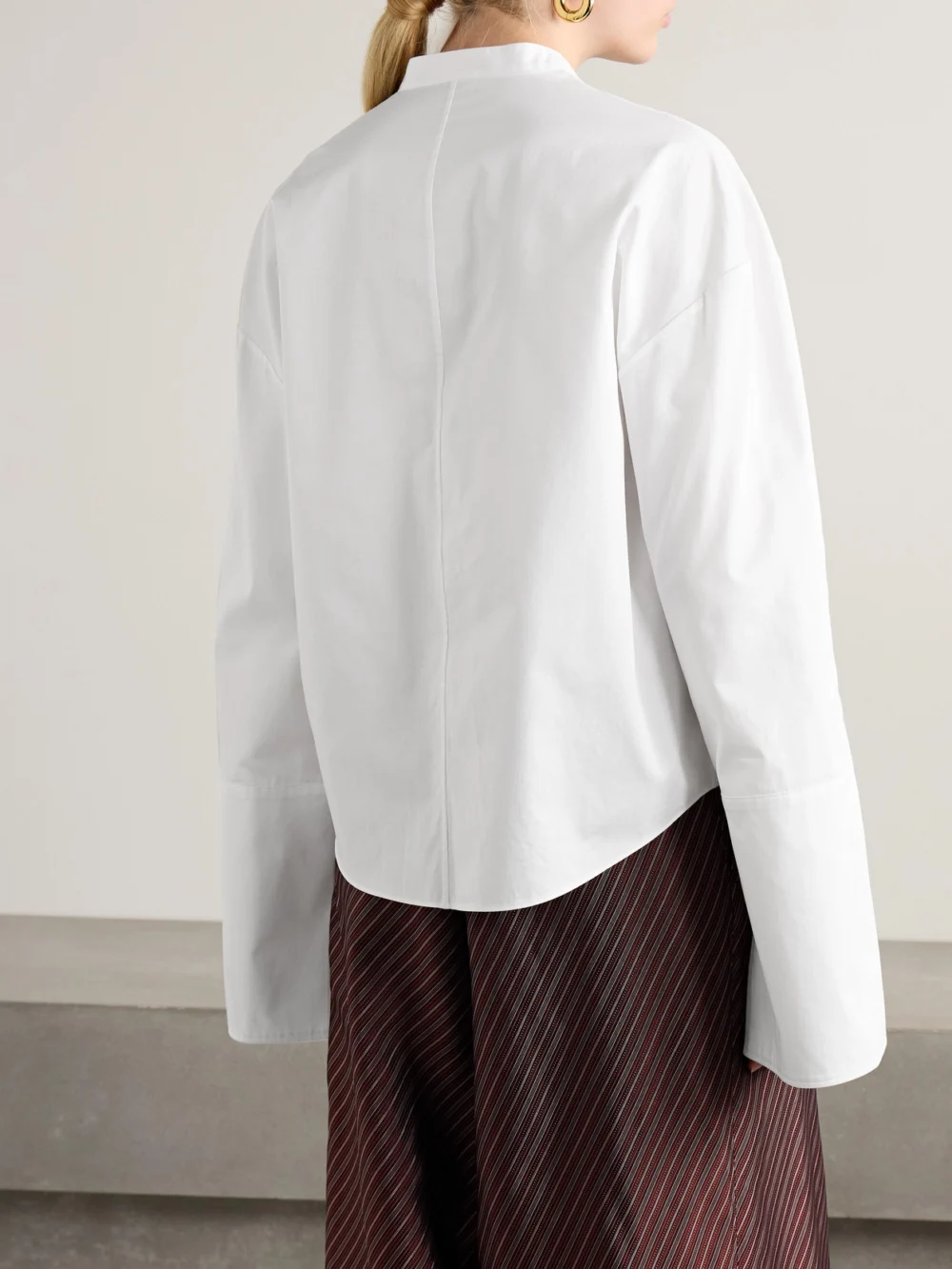 Back view of the Adam Lippes Mick Oversized Pintucked Organic Cotton-poplin Shirt