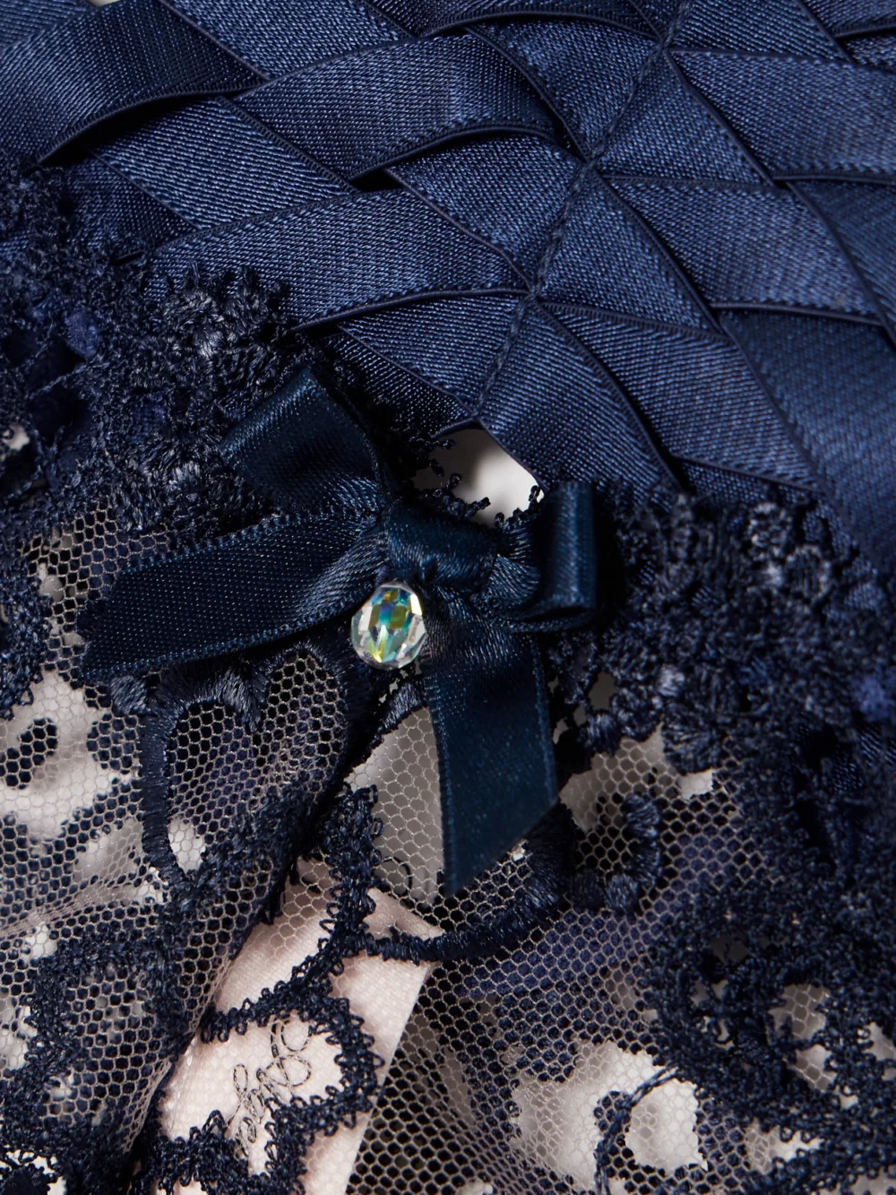 Close-up detail of the Agent Provocateur Dioni Woven Satin-trimmed Leavers Lace Briefs