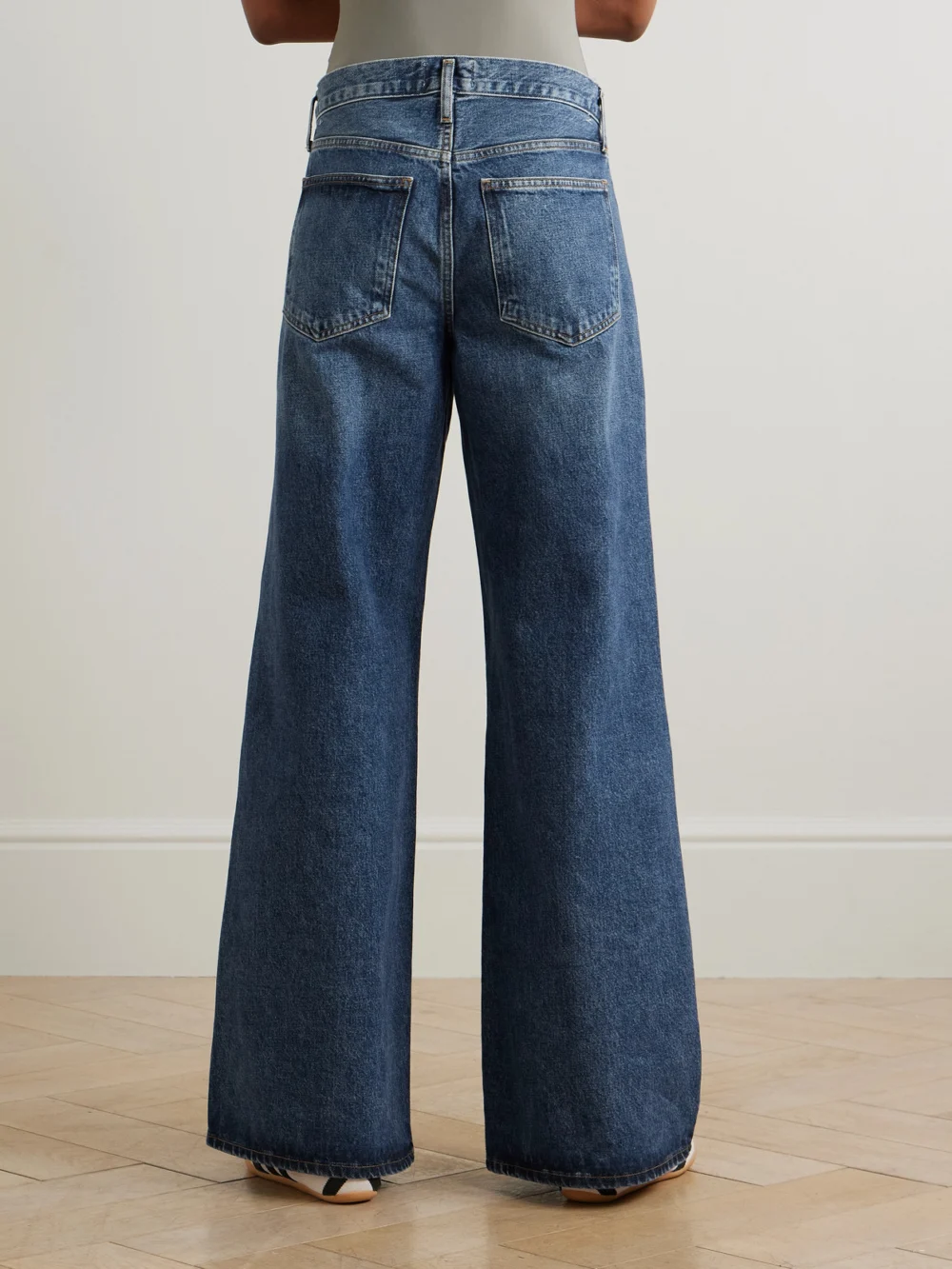 Back view of the Agolde Clara Baggy Organic Low-rise Flared Jeans