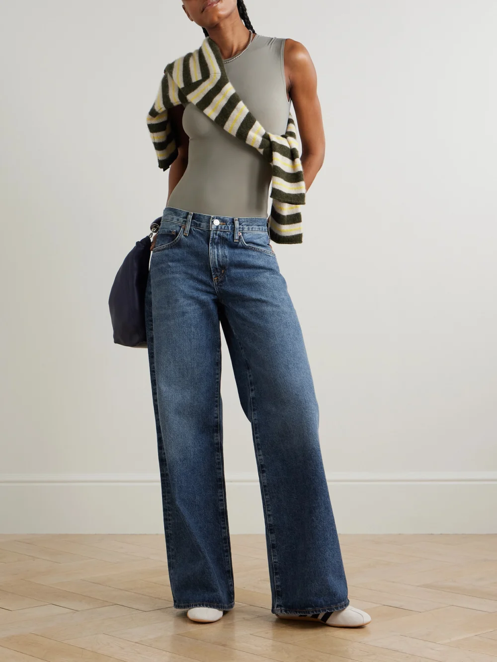 Agolde Clara Baggy Organic Low-rise Flared Jeans, worn by a model