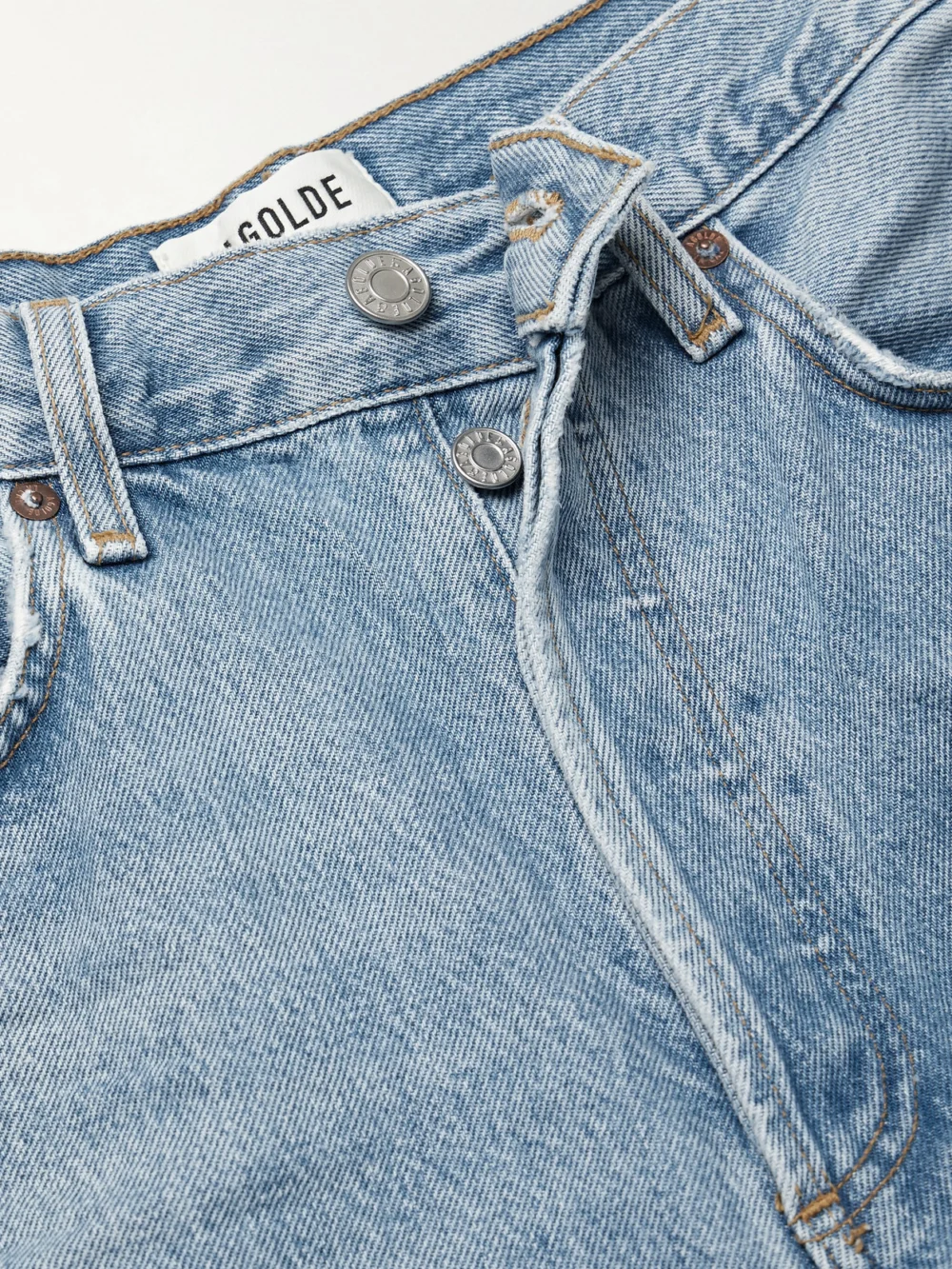 Close-up detail of the Agolde Dame High-rise Wide-leg Jeans