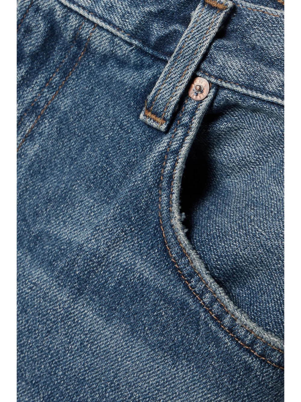 Close-up detail of the Agolde Leif Denim Midi Skirt