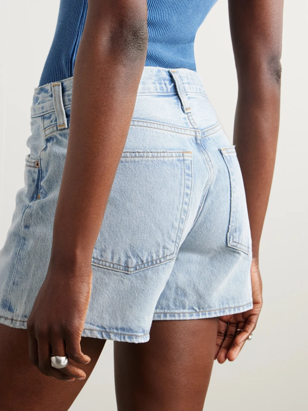 Back view of the Agolde Parker Long Clean Denim Shorts