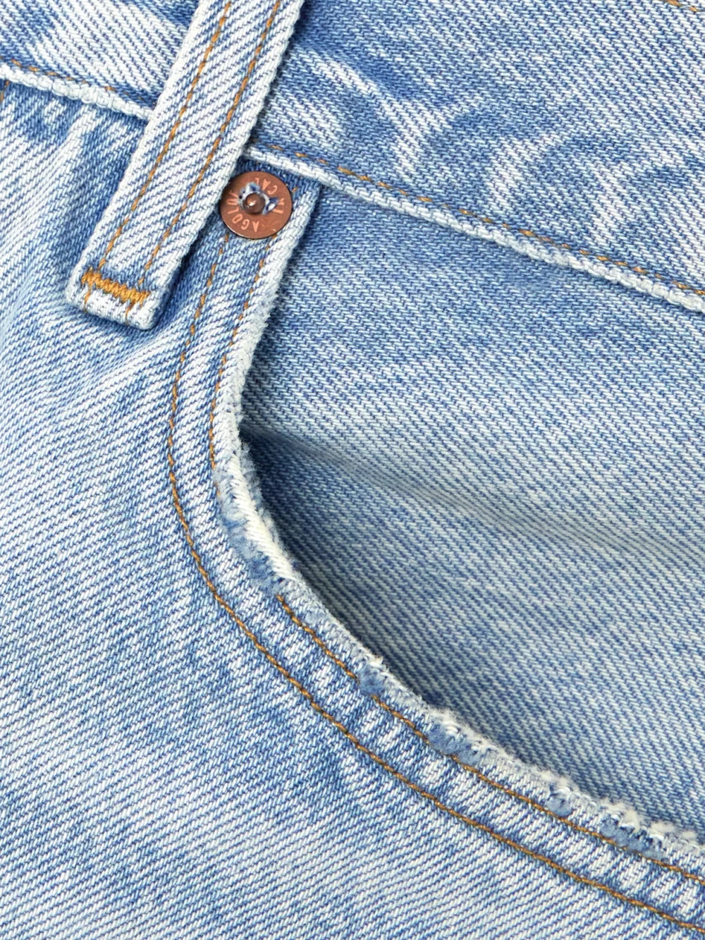 Close-up detail of the Agolde Parker Long Clean Denim Shorts