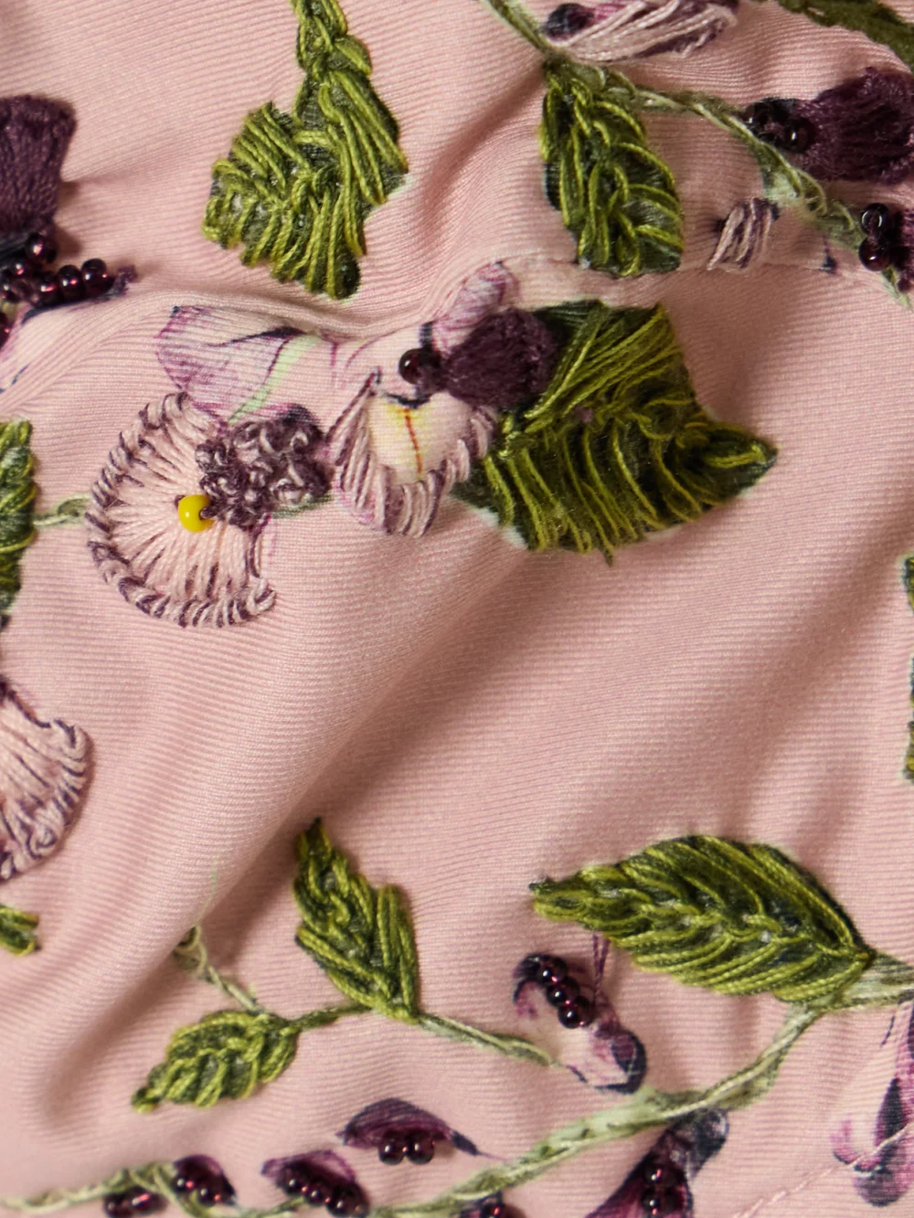 Close-up detail of the Agua by Agua Bendita Kiwi Wisteria Ruffled Embroidered Floral-print Underwired Recycled Bikini Top