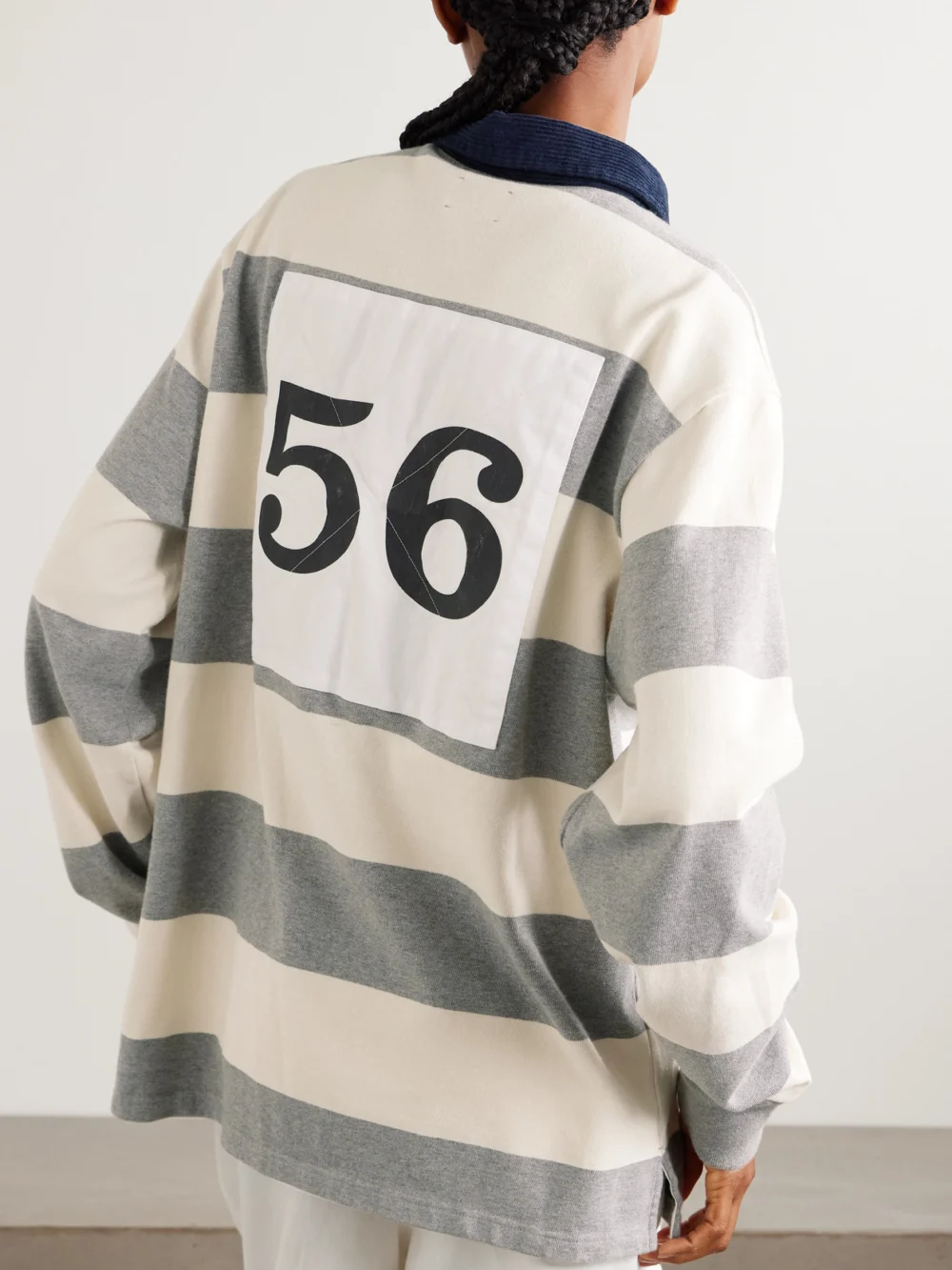 Back view of the Aimé Leon Dore Script Embroidered Printed Striped Corduroy-trimmed Cotton Rugby Shirt