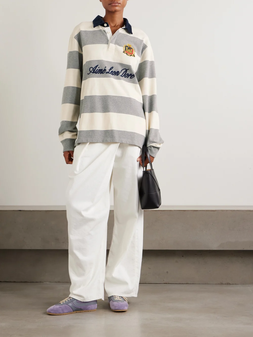 Aimé Leon Dore Script Embroidered Printed Striped Corduroy-trimmed Cotton Rugby Shirt, worn by a model