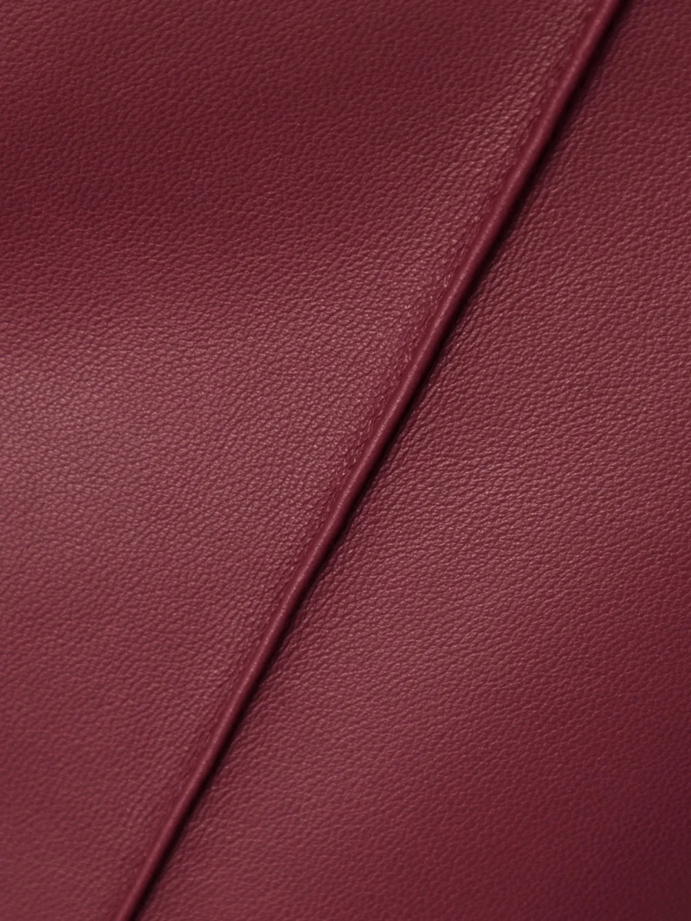 Close-up detail of the Akris Leather Straight-leg Pants