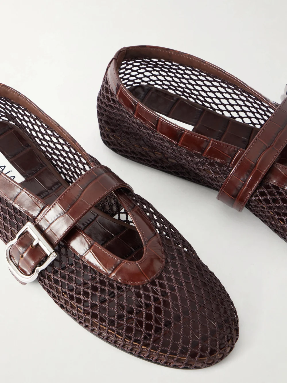 Close-up detail of the Alaïa La Ballerine Croc-effect Leather-trimmed Mesh Ballet Flats