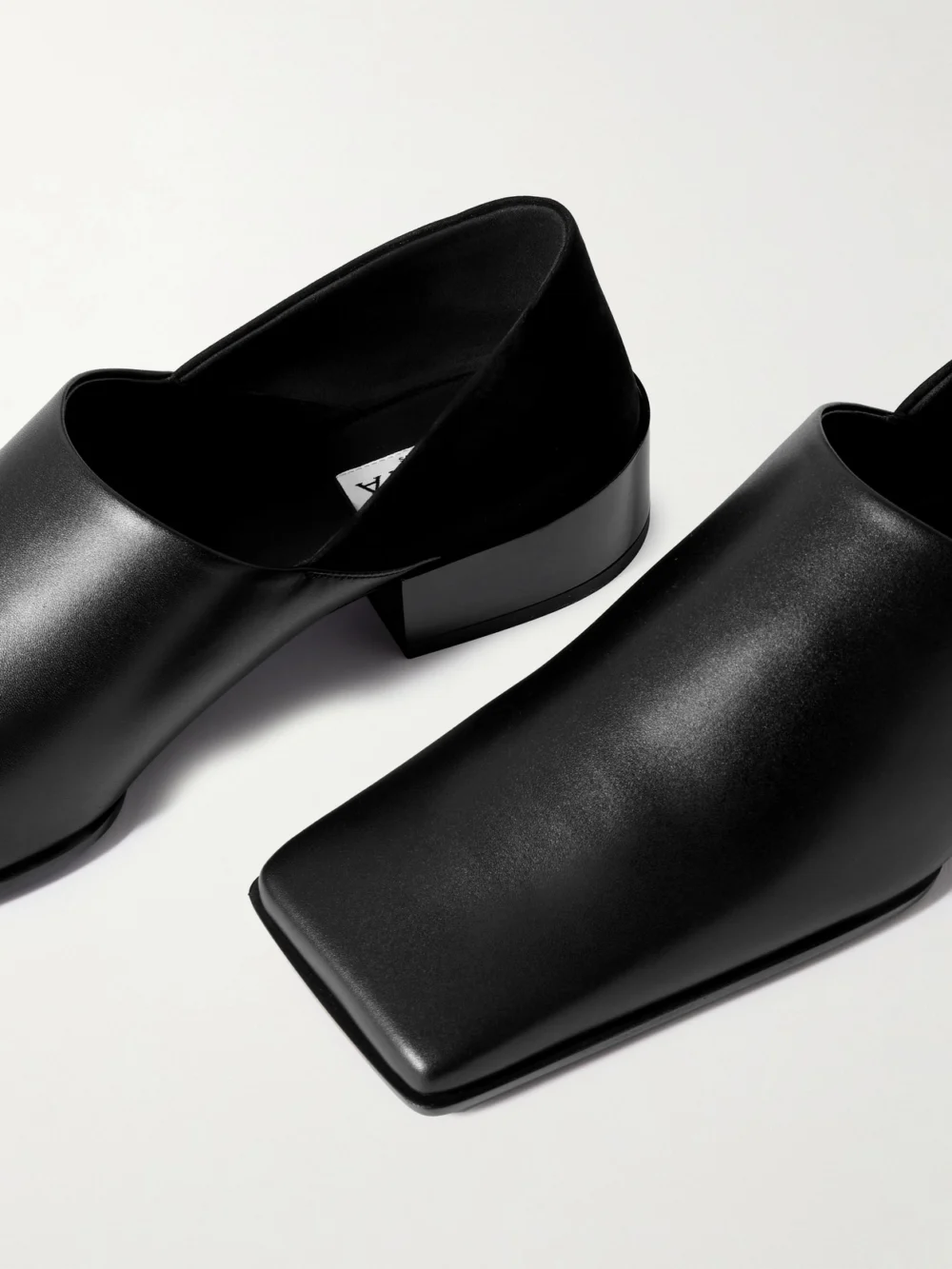 Close-up detail of the Alaïa Leather and Nubuck Loafers
