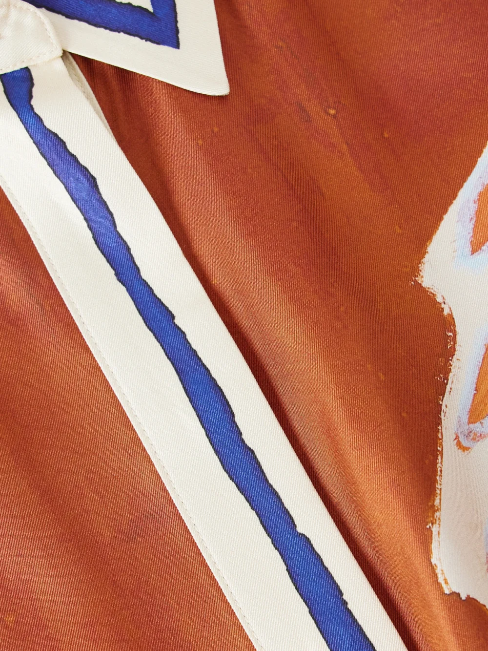 Close-up detail of the Alémais Soleil D'amour Printed Silk-twill Shirt