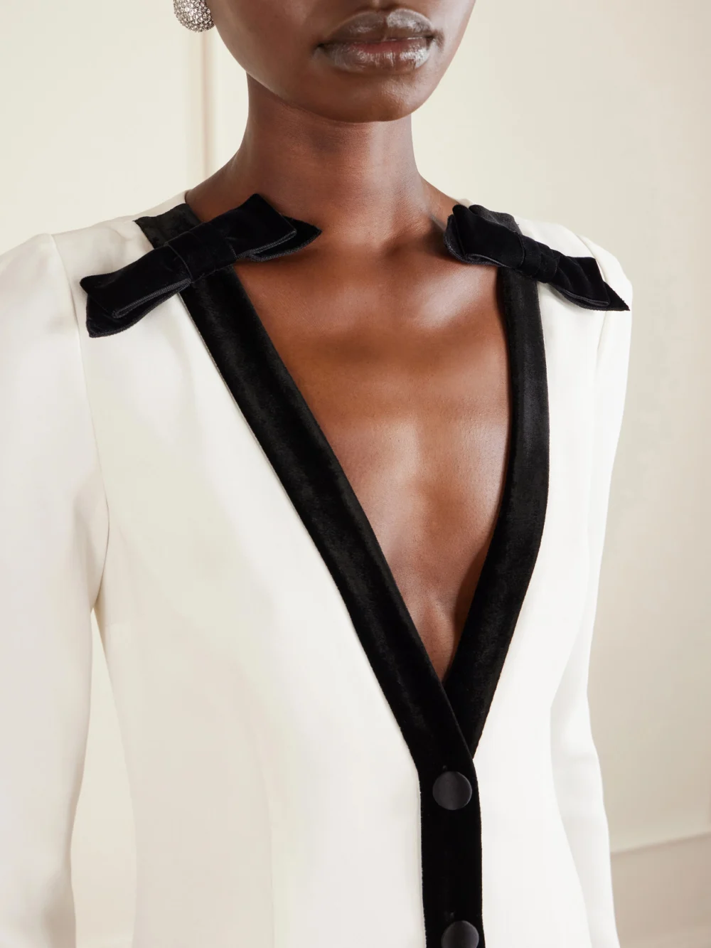 Close-up detail of the Alessandra Rich Bow-detailed Velvet-trimmed Stretch-cady Midi Dress