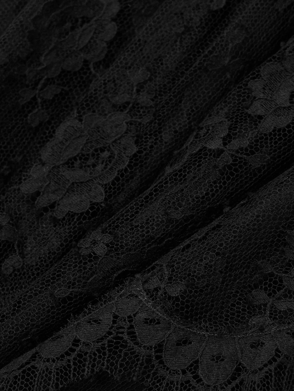 Close-up detail of the Alessandra Rich Bow-embellished Cotton-blend Lace Mini Dress