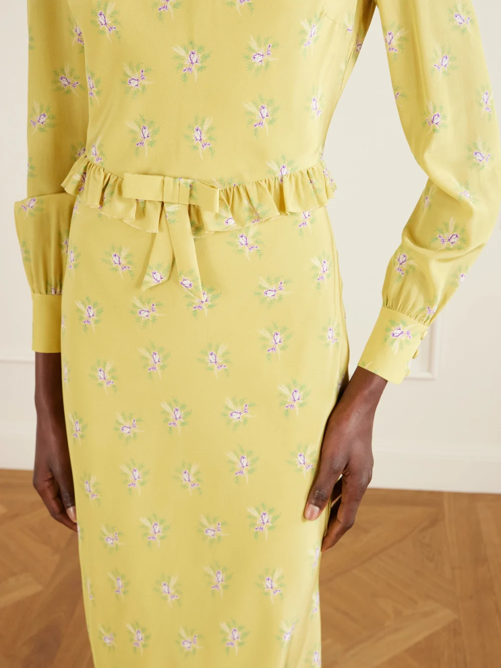 Close-up detail of the Alessandra Rich Ruffled Bow-detailed Floral-print Silk Crepe De Chine Midi Dress
