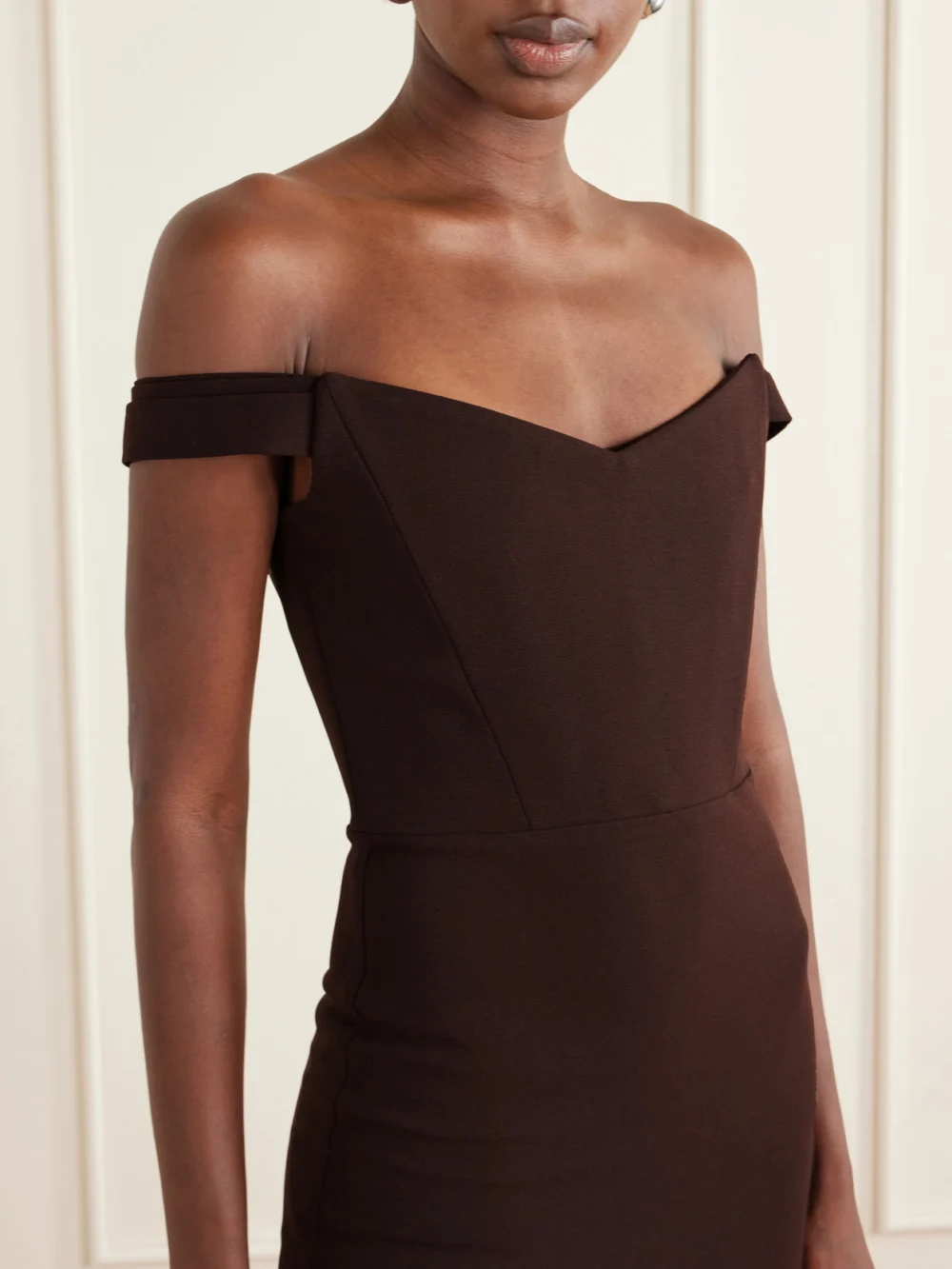 Close-up detail of the Alex Perry Off-the-shoulder Crepe Midi Dress