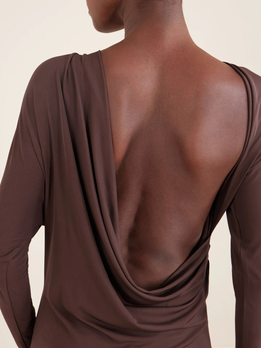 Close-up detail of the Alex Perry Open-back Draped Jersey Mini Dress