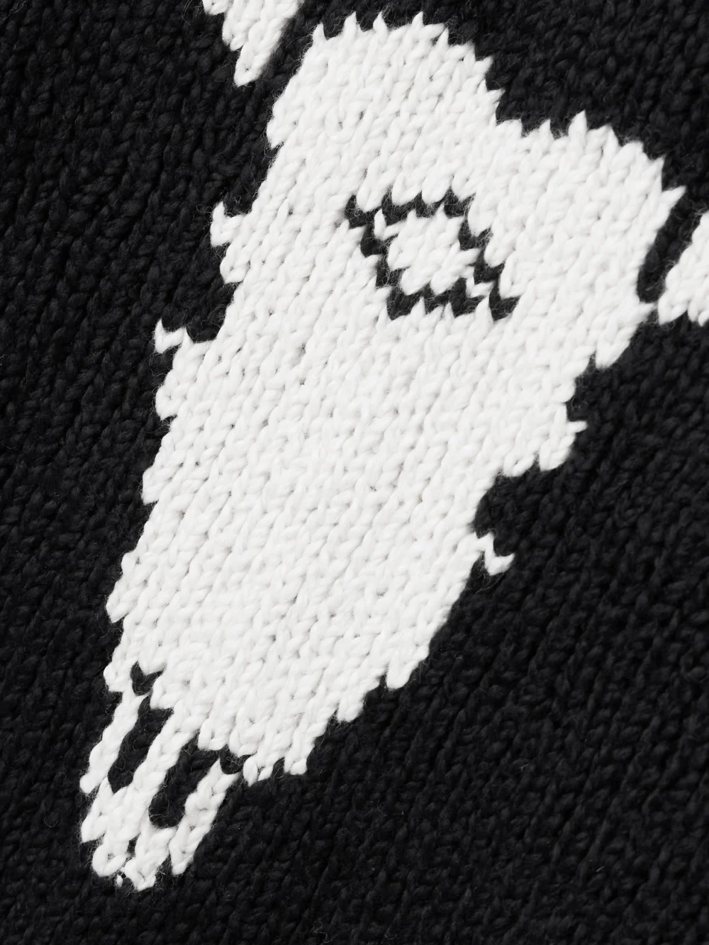 Close-up detail of the Alix Of Bohemia Renny Cow Skull Intarsia Organic Cotton Mini Dress