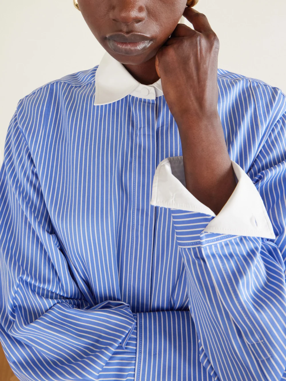 Close-up detail of the Altuzarra Floyd Belted Striped Cotton-poplin Midi Dress