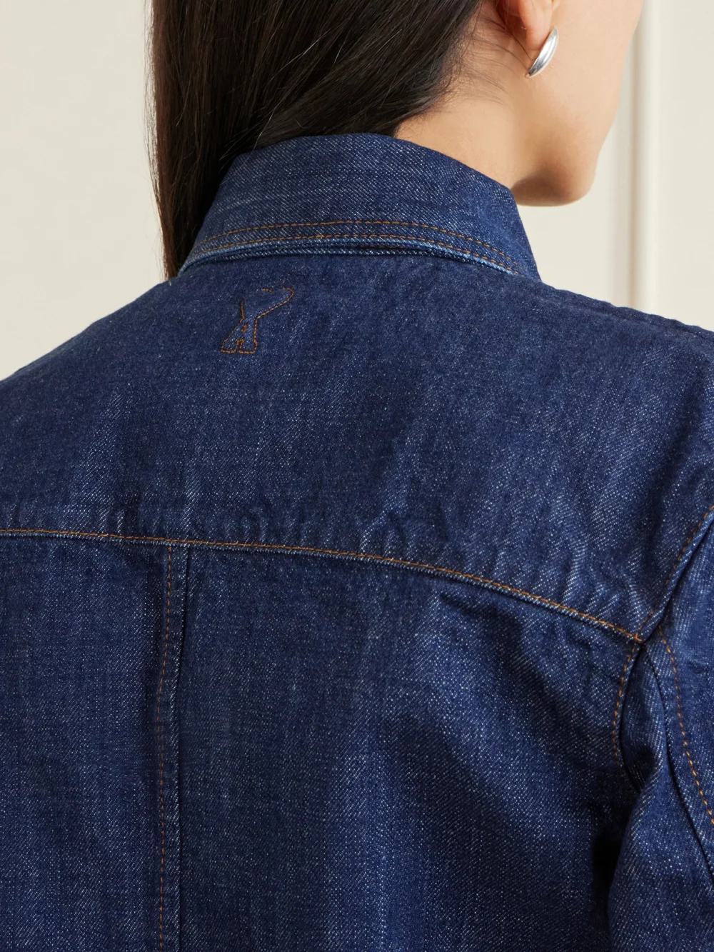Close-up detail of the Ami Paris Paneled Denim Shirt