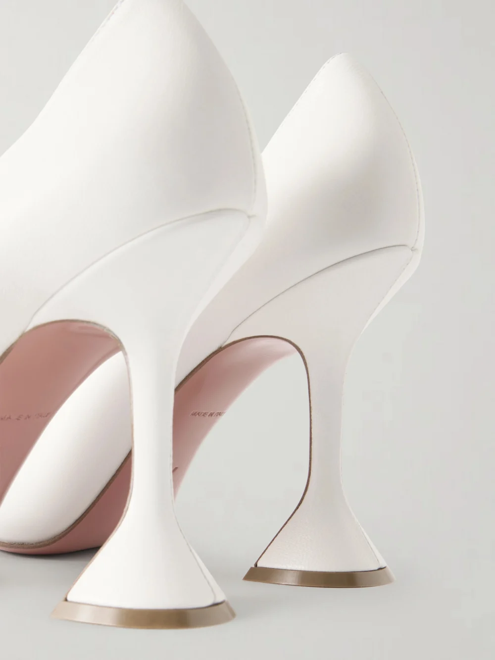 Close-up detail of the Amina Muaddi Ami 95 Leather Pumps