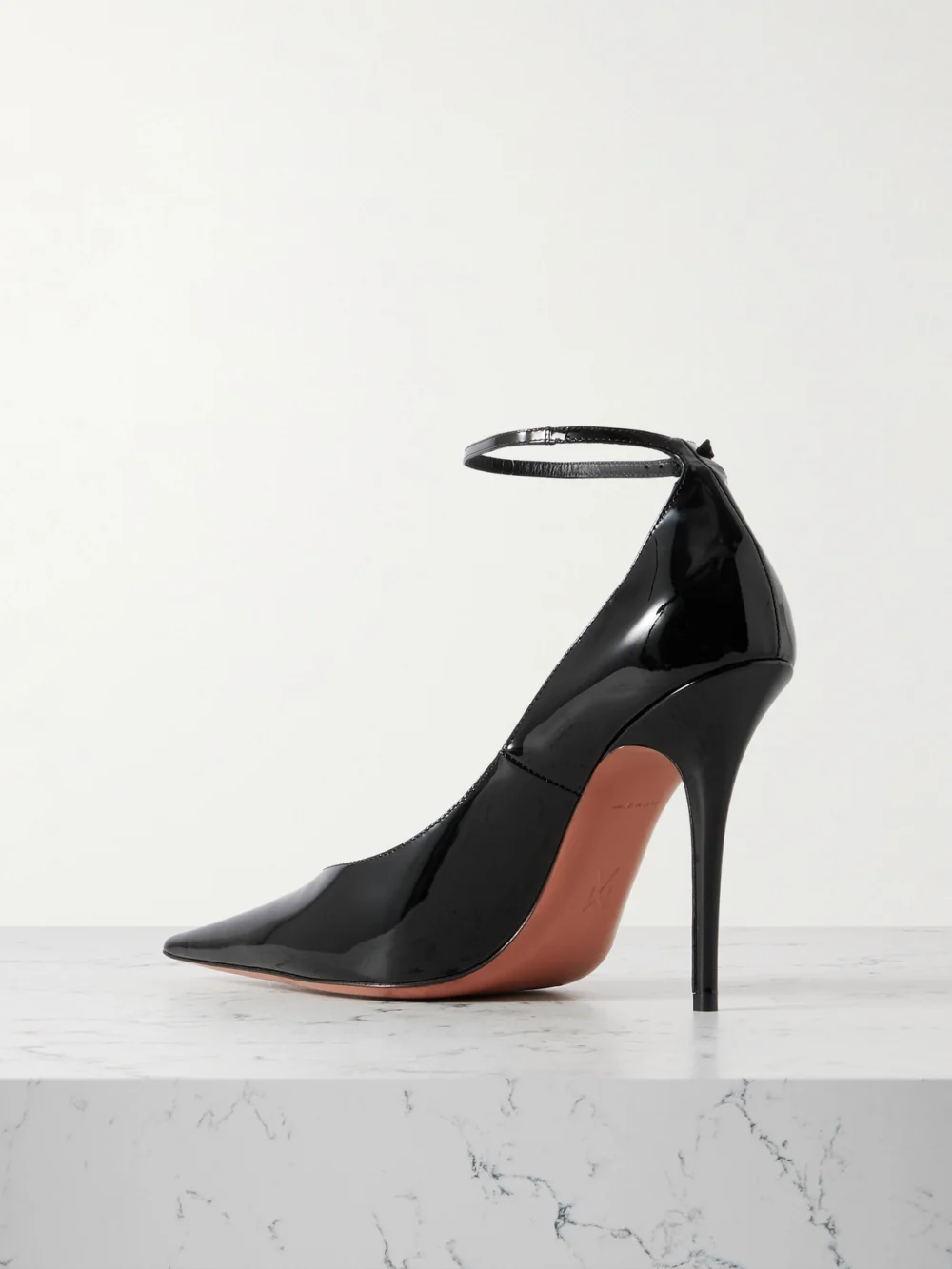 Back view of the Amina Muaddi Anok 105 Patent-leather Point-toe Pumps