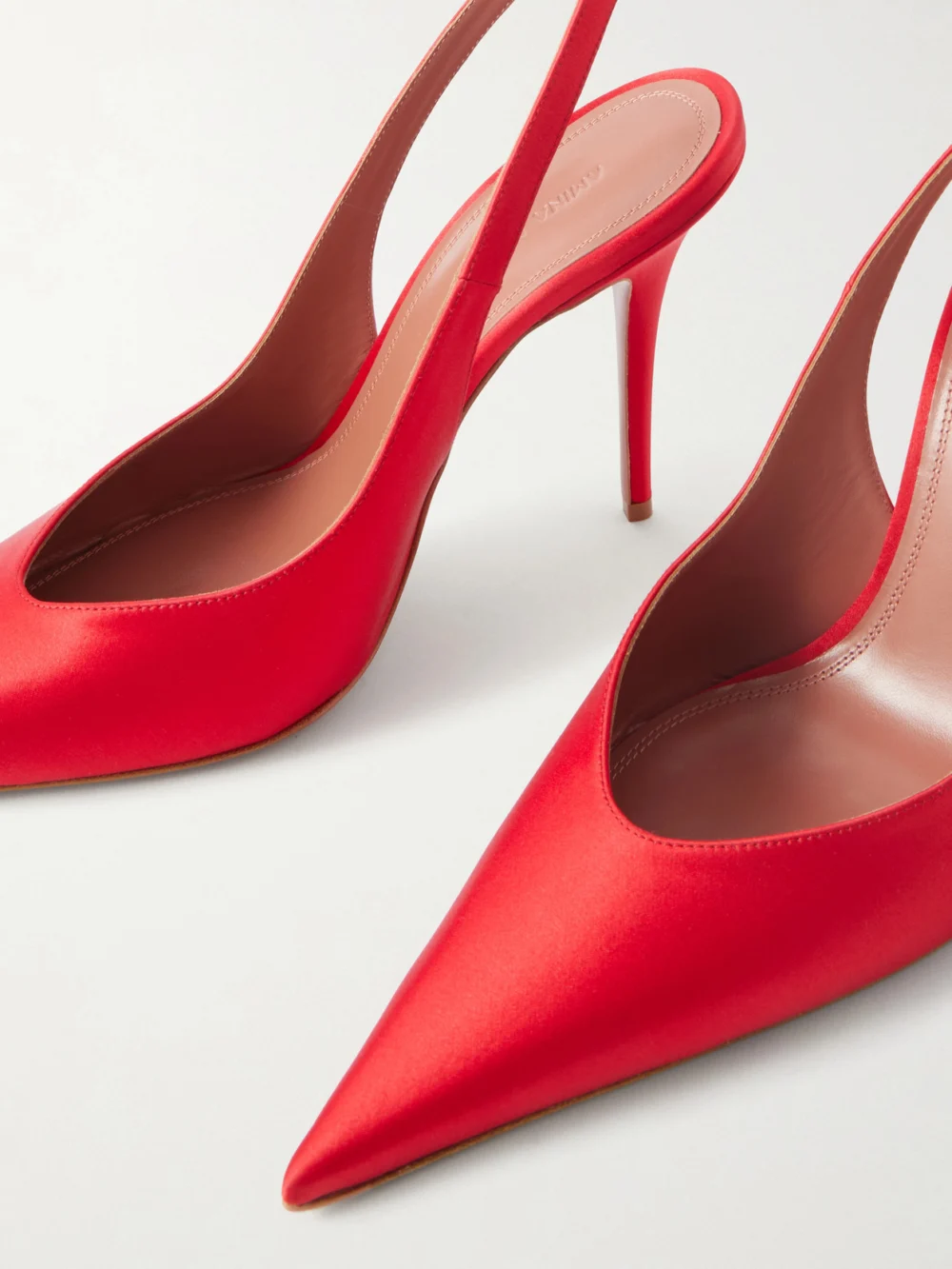 Close-up detail of the Amina Muaddi Anok 105 Satin Slingback Pumps
