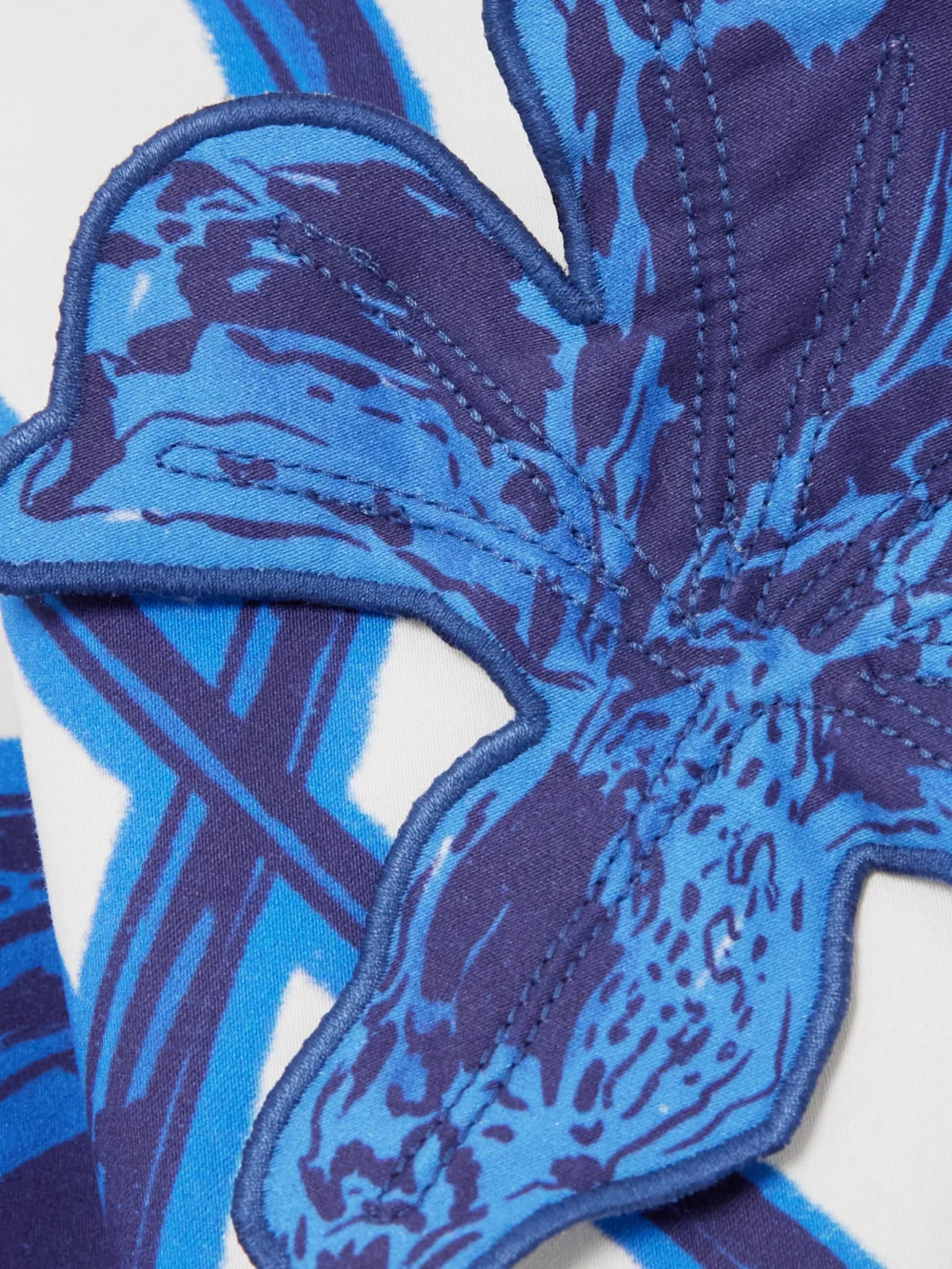 Close-up detail of the Andres Otalora Appliquéd Cotton-blend Twill Mini Dress